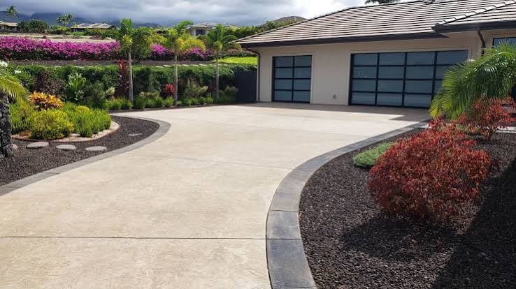 Finished decorative concrete driveway with textured, colored finish