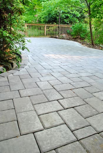 Close-up of a paver patio's herringbone pattern